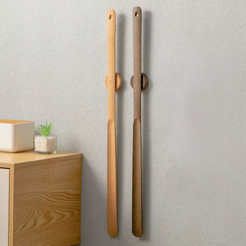 Stylish magnetic wood shoehorn. Long wood shoe accessory for easy on/off & elegant wall storage.