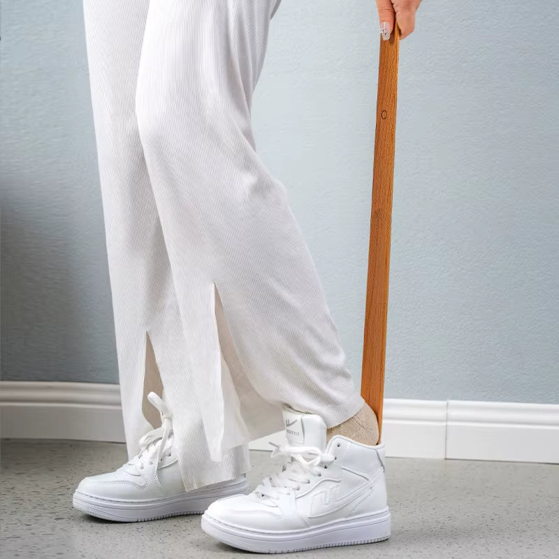 Beechwood magnetic shoehorn, a sleek daily living aid. Long wood shoehorn for effortless footwear & decor.