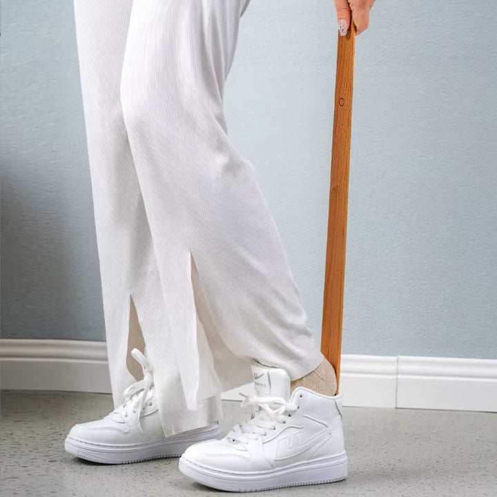 Beechwood magnetic shoehorn, a sleek daily living aid. Long wood shoehorn for effortless footwear & decor.