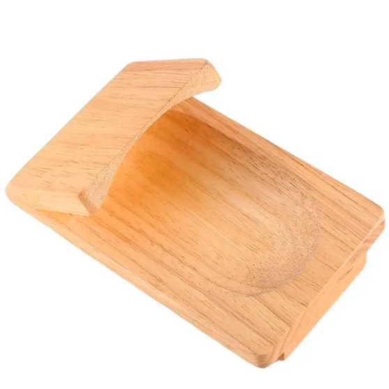 Kitchen accessory: wooden oyster clamp for effortless and safe shucking of oysters, enhancing seafood prep.