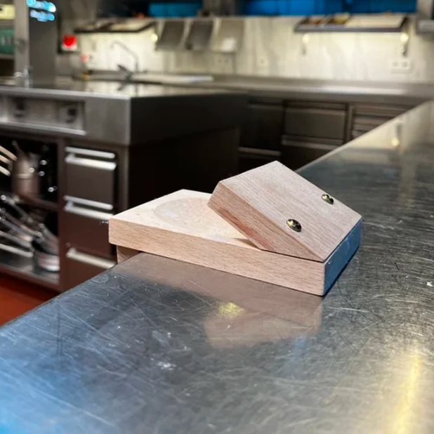 Home kitchen oyster shucking clamp. Essential seafood tool for safe and easy oyster opening.