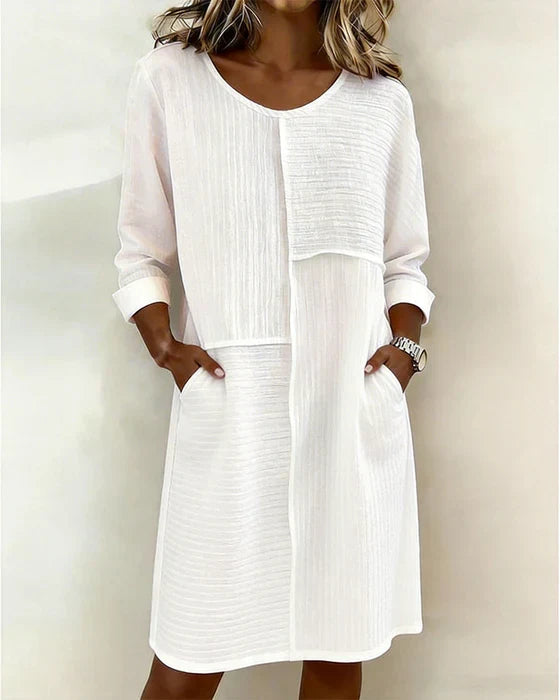 Effortless textured shift dress for women, 3/4 sleeves, pockets. Comfortable, elegant casual summer dress.