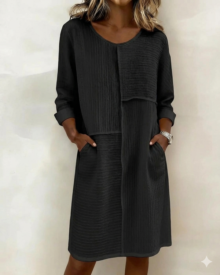 Versatile women's textured shift dress, 3/4 sleeves, pockets. Elegant & comfortable for casual spring/summer fashion.