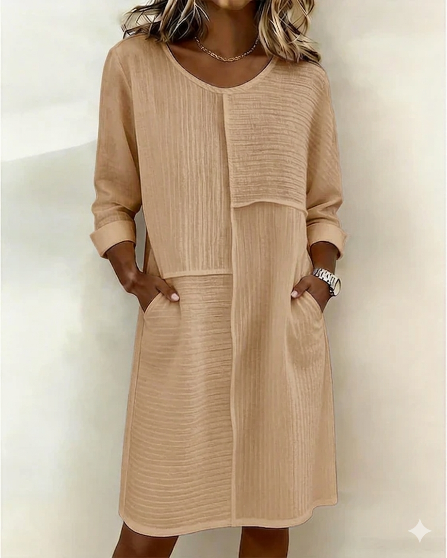 Effortless modest women's textured shift dress. Comfortable 3/4 sleeve design, perfect for spring/summer everyday wear.