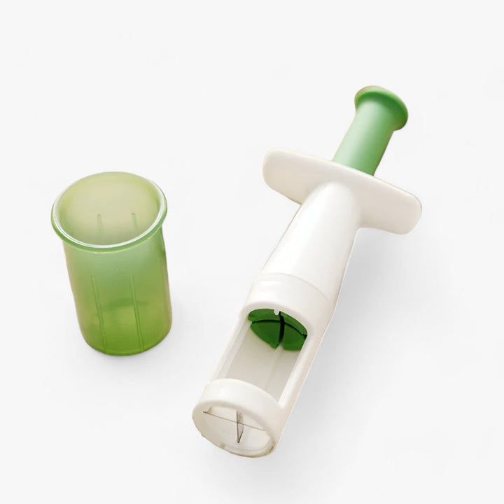 Durable fruit slicer for fast, even cuts of cherry tomatoes, grapes, and other small fruits in the kitchen.