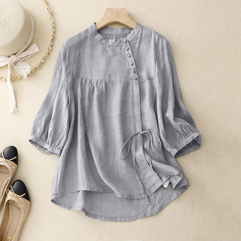 Effortless women's tie-waist blouse with stylish puffed sleeves, perfect for elegant spring & summer fashion.