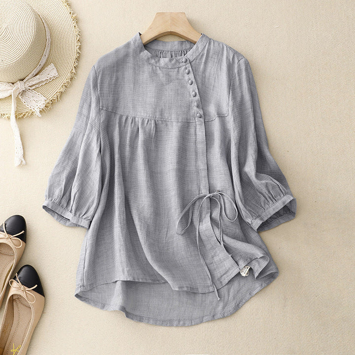 Effortless women's tie-waist blouse with stylish puffed sleeves, perfect for elegant spring & summer fashion.