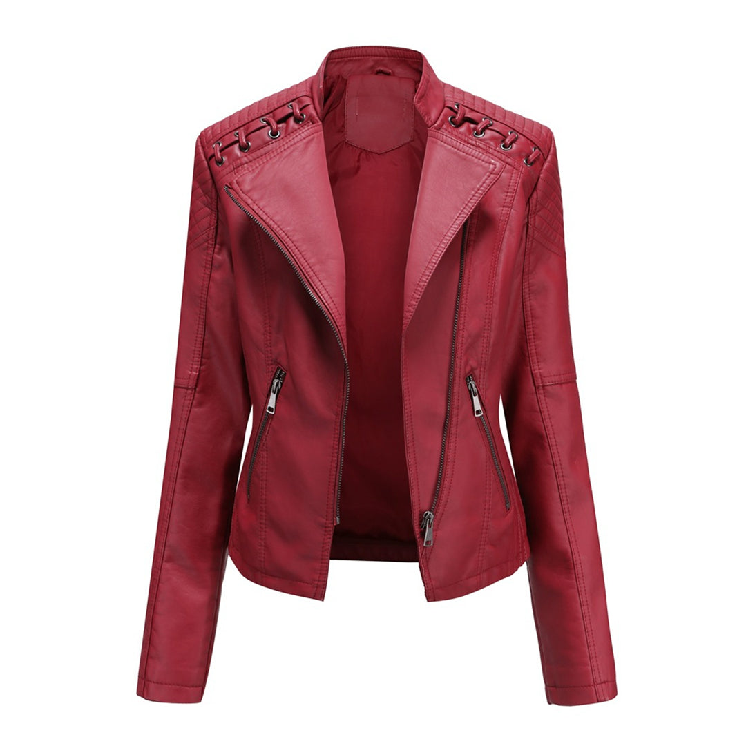 Woman models Elani trendy leather jacket, perfect versatile chic outerwear for spring/autumn fashion.