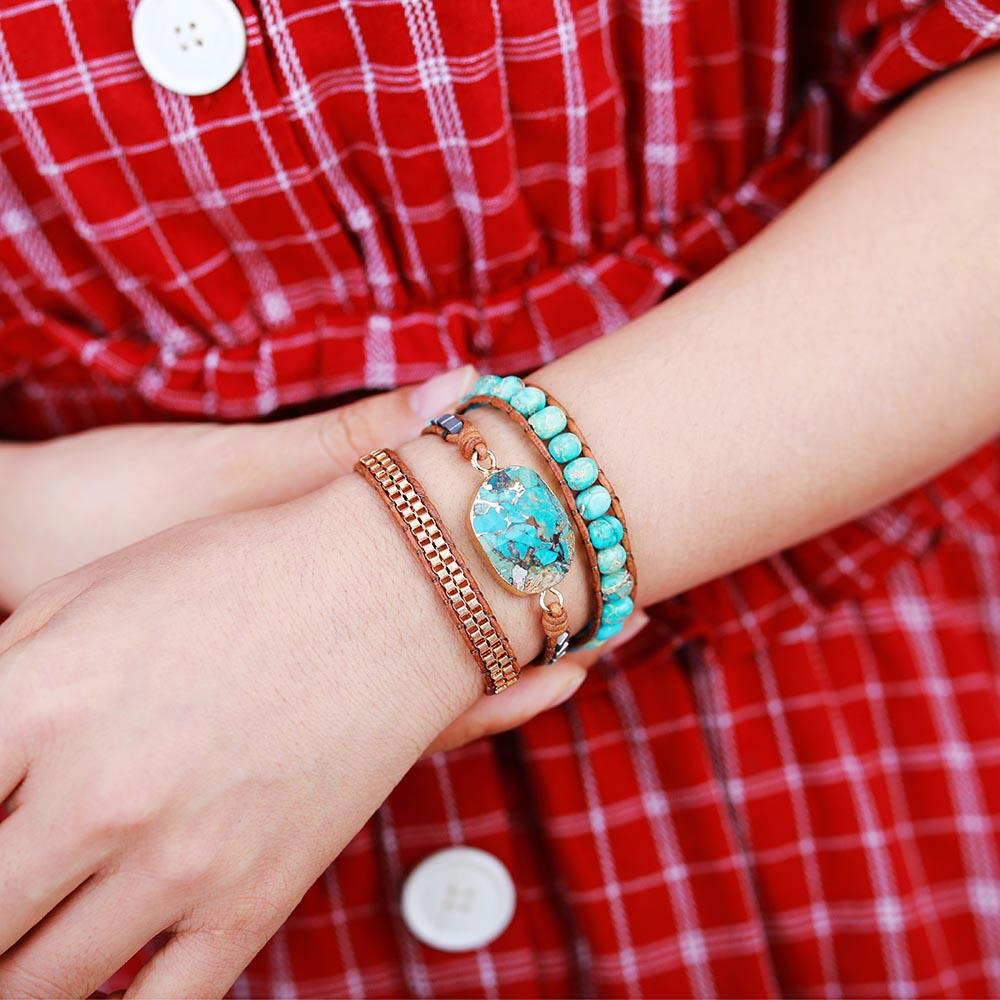 Turquoise and jasper crystal wrap bracelet with leather cord, promoting calming energy