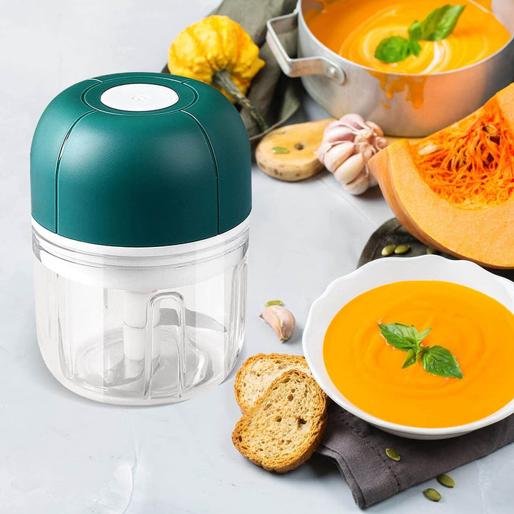 Electric garlic press, compact rechargeable food chopper for effortless chopping in the kitchen.