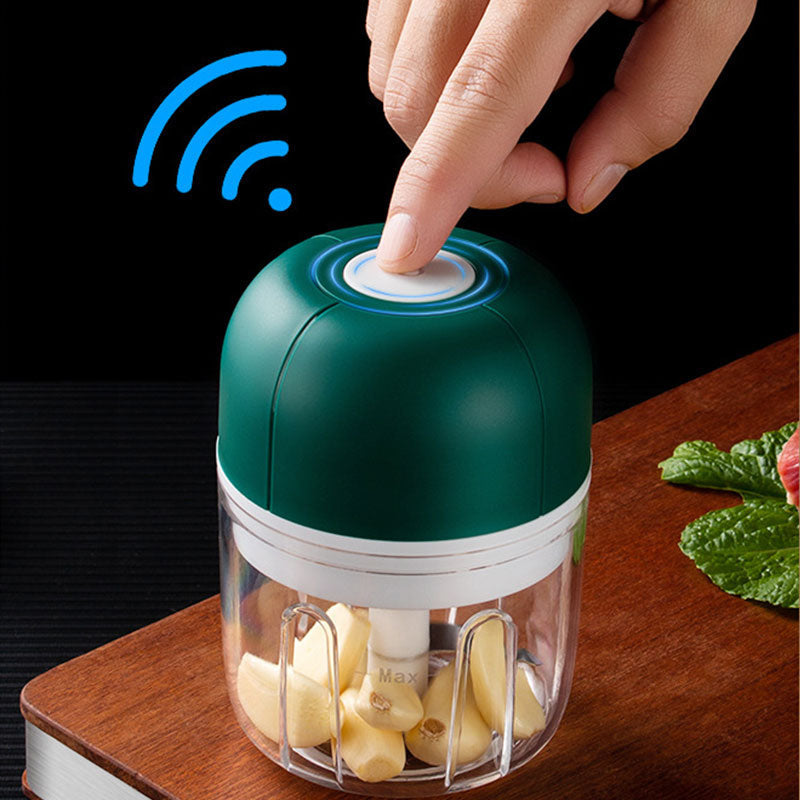 Compact electric garlic chopper, a powerful kitchen tool for efficient vegetable mincing & food prep.