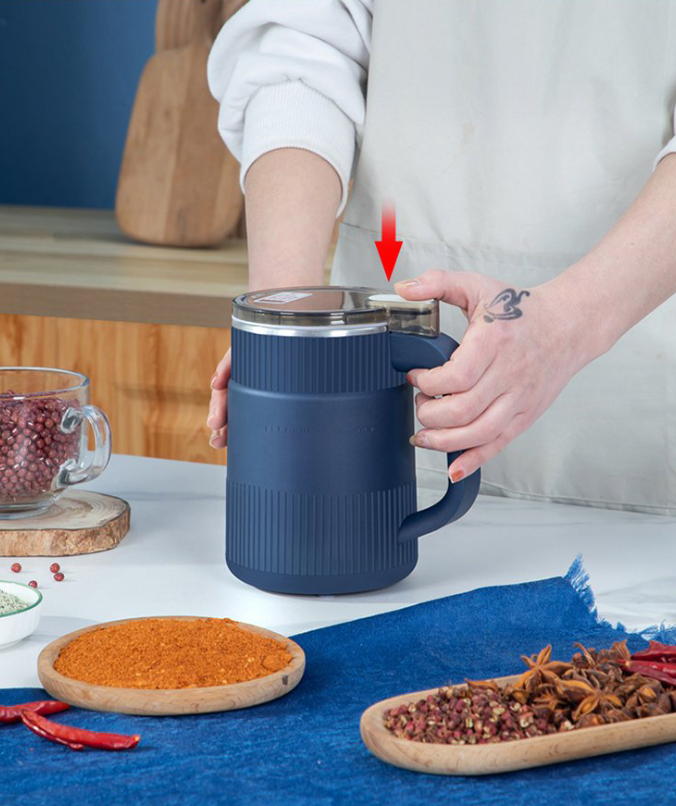 Sleek electric grain mill, a must-have kitchen appliance for efficient food prep & fresh flour production.