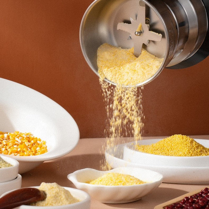 Portable electric spice & coffee grinder. GrindMaster for beans, grains, nuts in a modern stainless steel design.