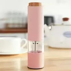 Sleek electric spice mill, ideal for grinding fresh pepper, sea salt, and herbs. Essential kitchen tool.