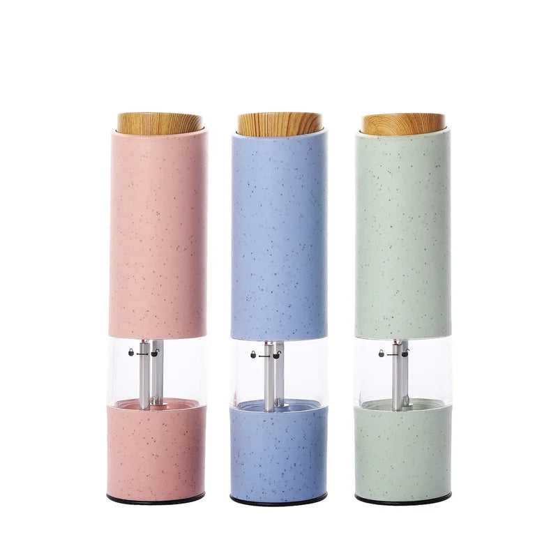 Electric pepper grinder in action, providing freshly ground spices for enhanced cooking and food prep.