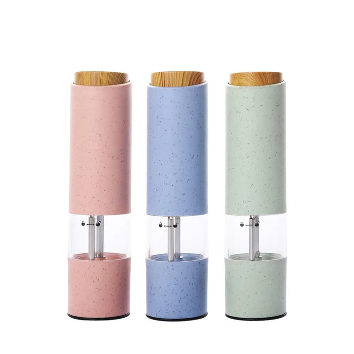 Electric pepper grinder in action, providing freshly ground spices for enhanced cooking and food prep.