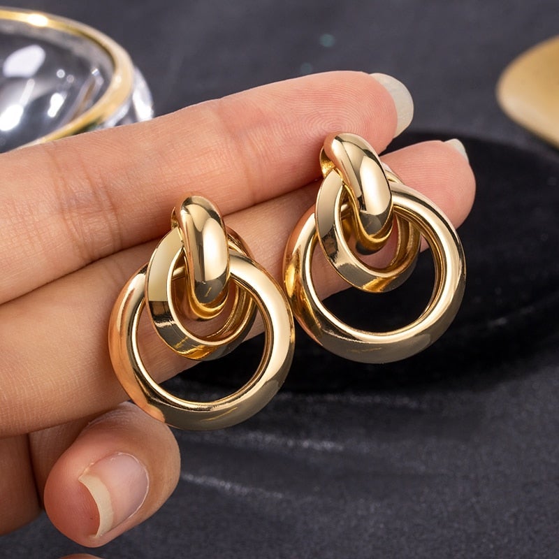 Elegant 18K gold plated drop earrings for women, featuring a minimalist, luxurious design. Perfect for gifts.