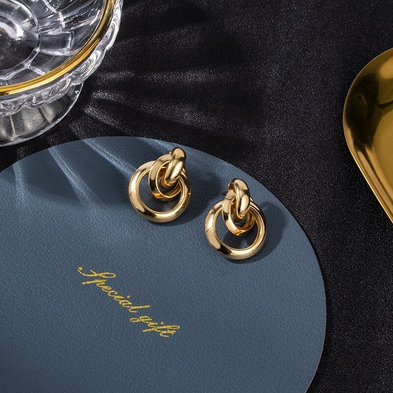 Celestyn 18K gold plated drop earrings, a timeless piece of luxury women's jewelry. Elegant and minimalist.
