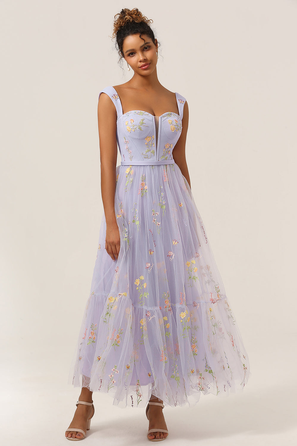 Anna elegant A-line gown with intricate embroidery. A stunning women's ball gown for formal occasions.