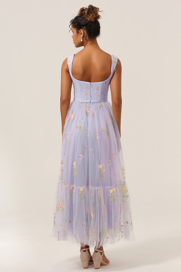 Beautifully embroidered women's A-line formal dress. A long, elegant evening gown for special events.