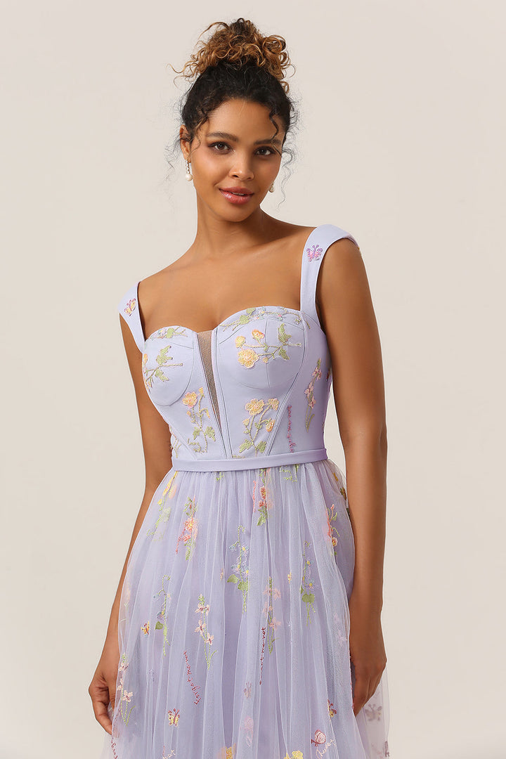 Women's exquisite embroidered A-line ball gown. This long, elegant dress is perfect for prom and formal wear.