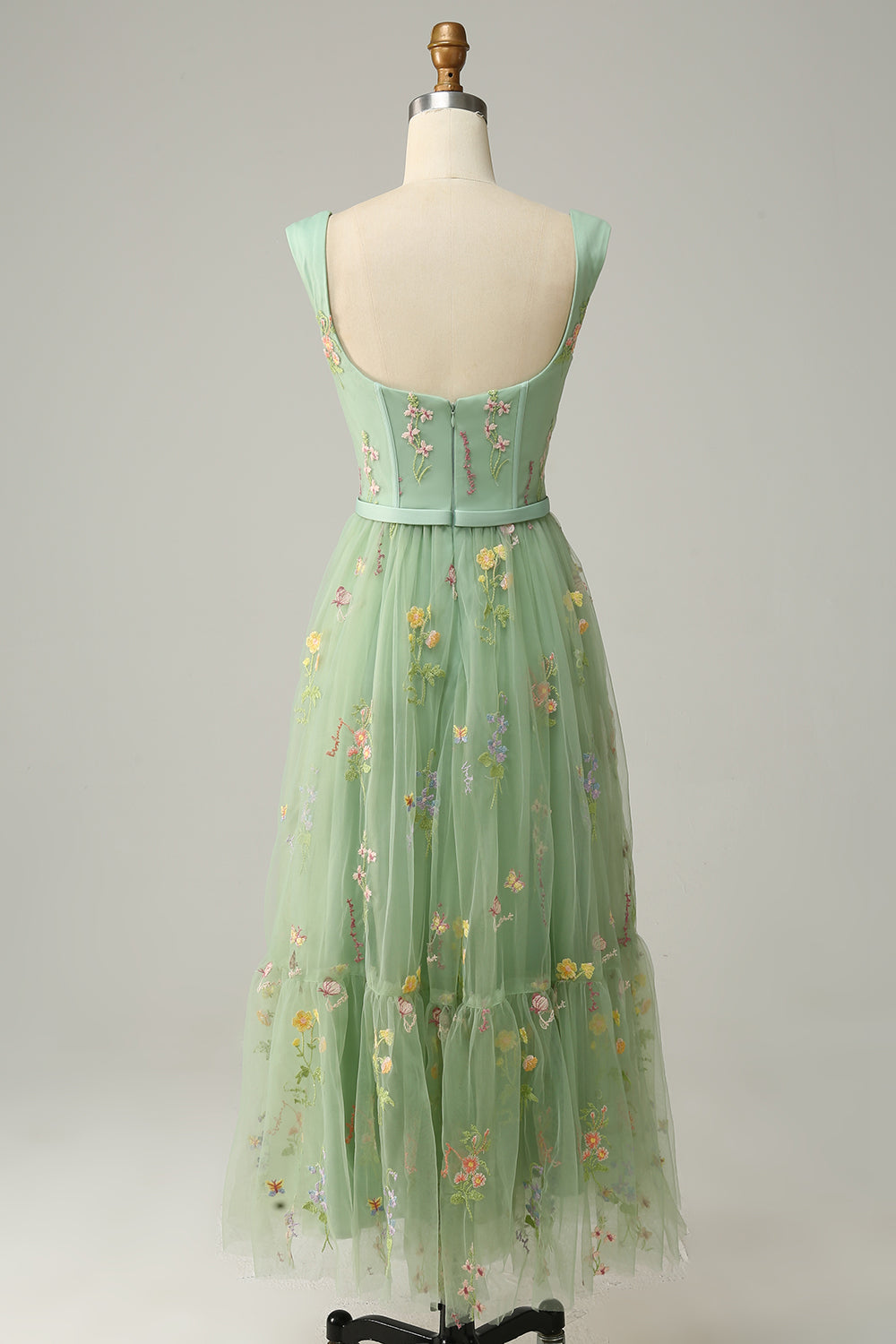 Stunning women's evening gown, long A-line style, featuring beautiful embroidered details.