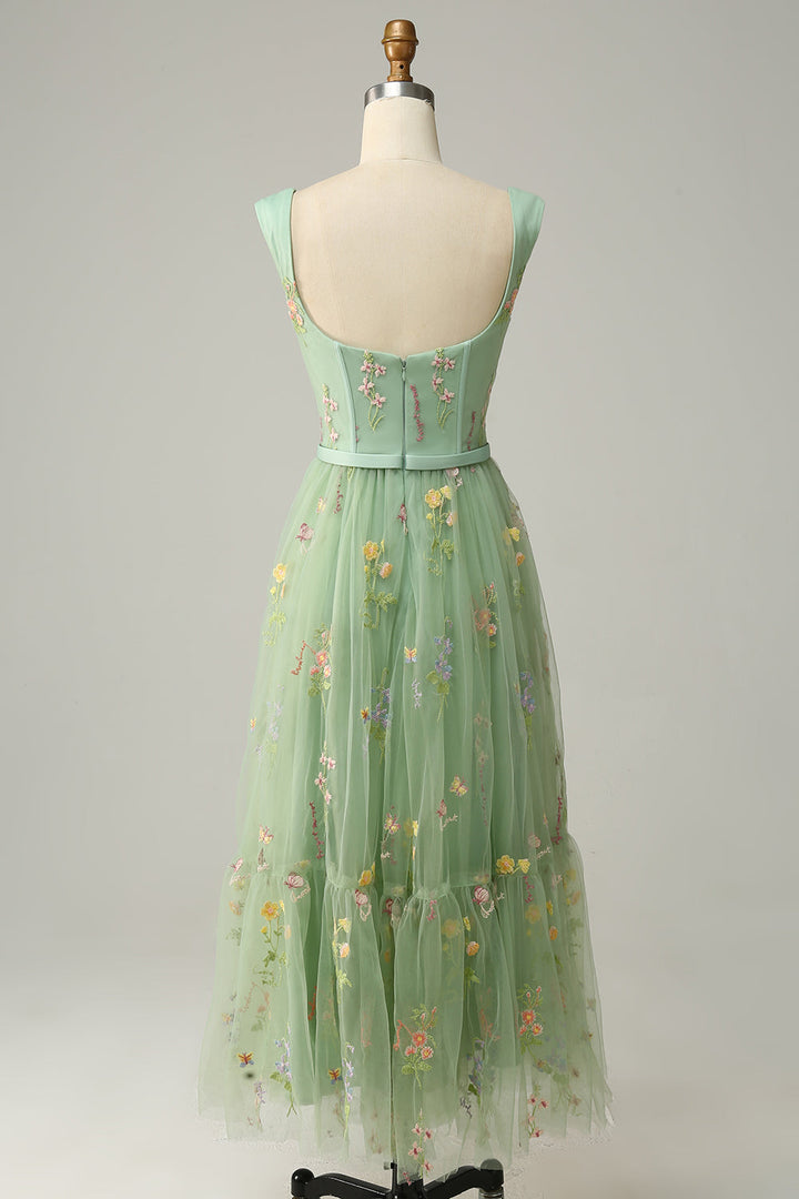Stunning women's evening gown, long A-line style, featuring beautiful embroidered details.