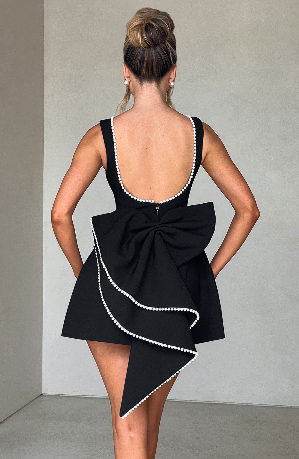 Sophisticated women's pearl trim A-line mini dress, a perfect choice for homecoming or evening events.