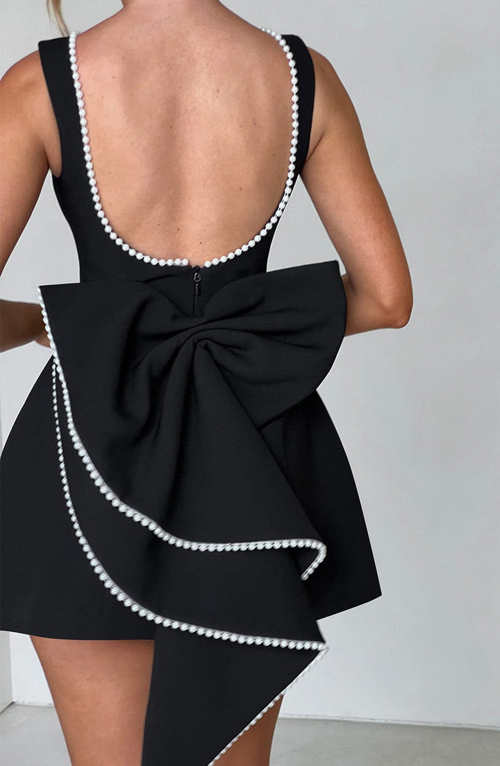 Stylish A-line mini dress for women, featuring elegant pearl embellishments, ideal for homecoming.