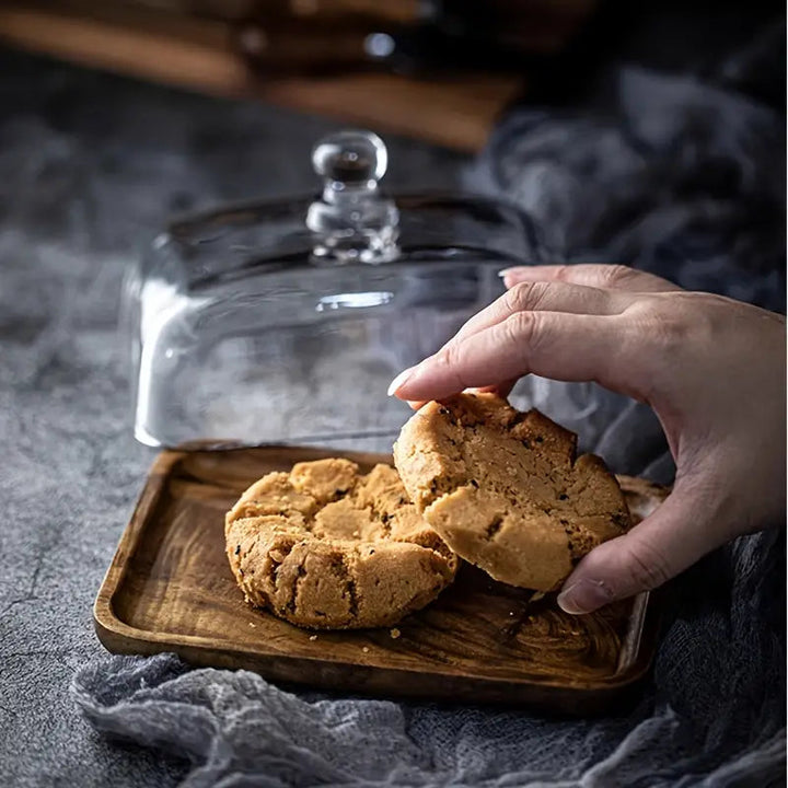 Modern wood butter dish with a clear glass dome, enhancing your kitchen counter & dining decor with style.