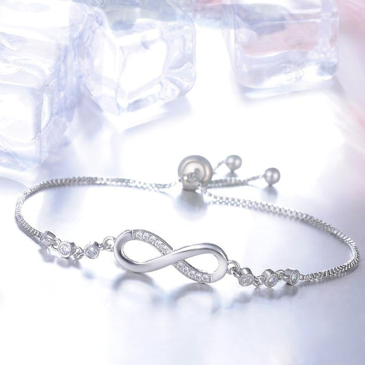 Stylish gold infinity bracelet, adjustable for perfect fit. A timeless elegant jewelry gift.