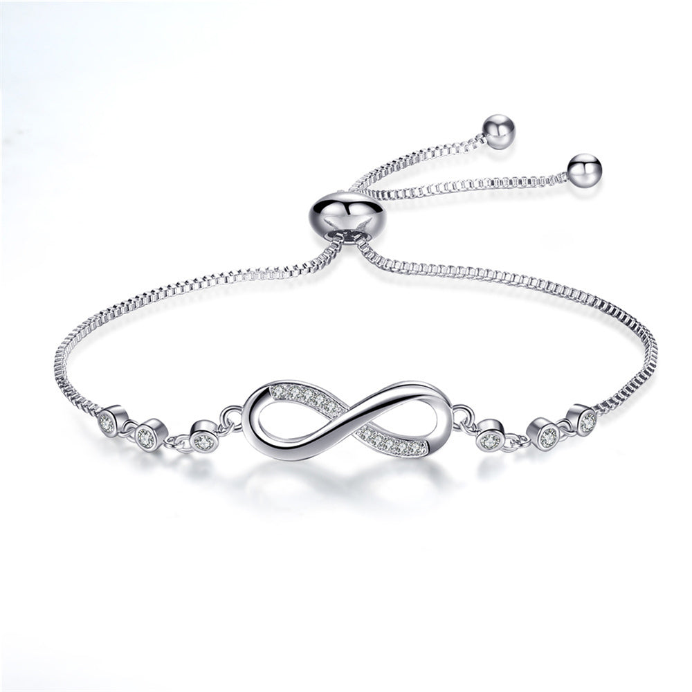 Modern silver infinity bracelet, elegantly adjustable. Ideal timeless jewelry gift for any occasion.