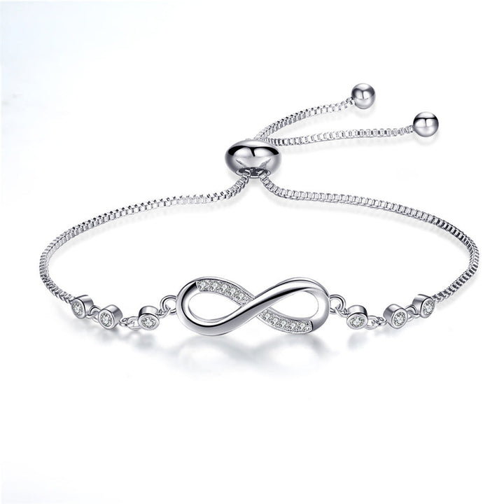 Modern silver infinity bracelet, elegantly adjustable. Ideal timeless jewelry gift for any occasion.