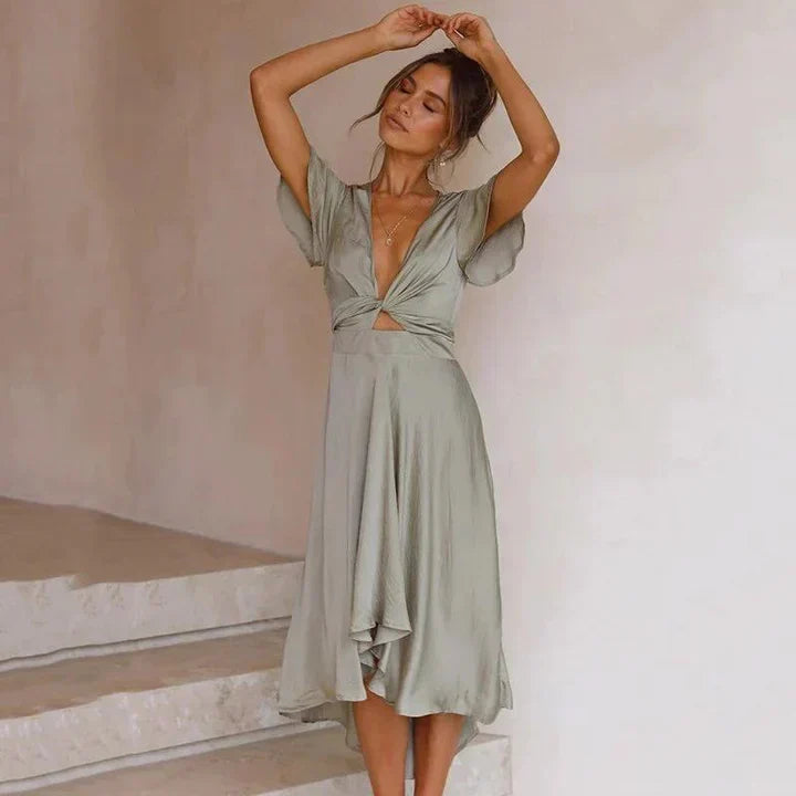 Flowing retro summer dress for women, elegant midi length. Ideal as a casual sundress or vacation beach dress.
