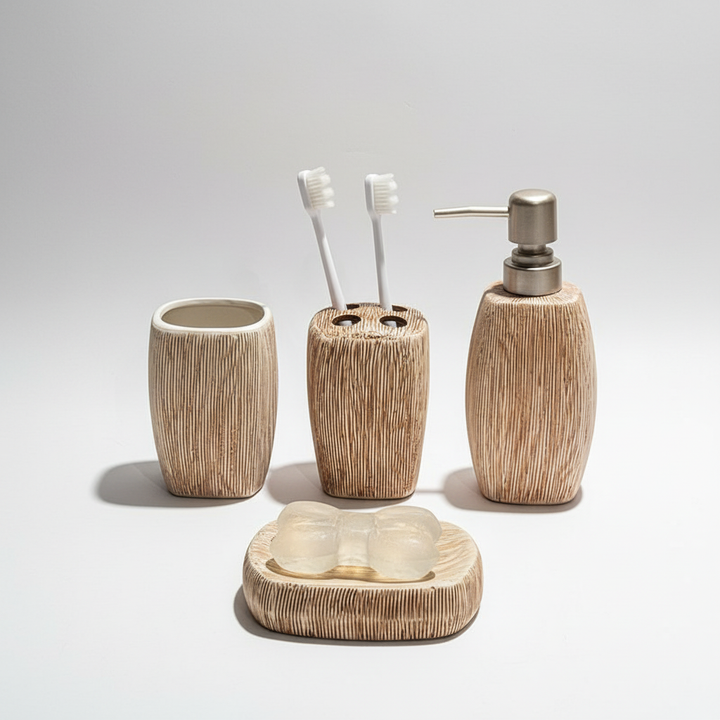 Close-up of a stylish ceramic bathroom set featuring wood grain soap dispenser and toothbrush holder in beige.