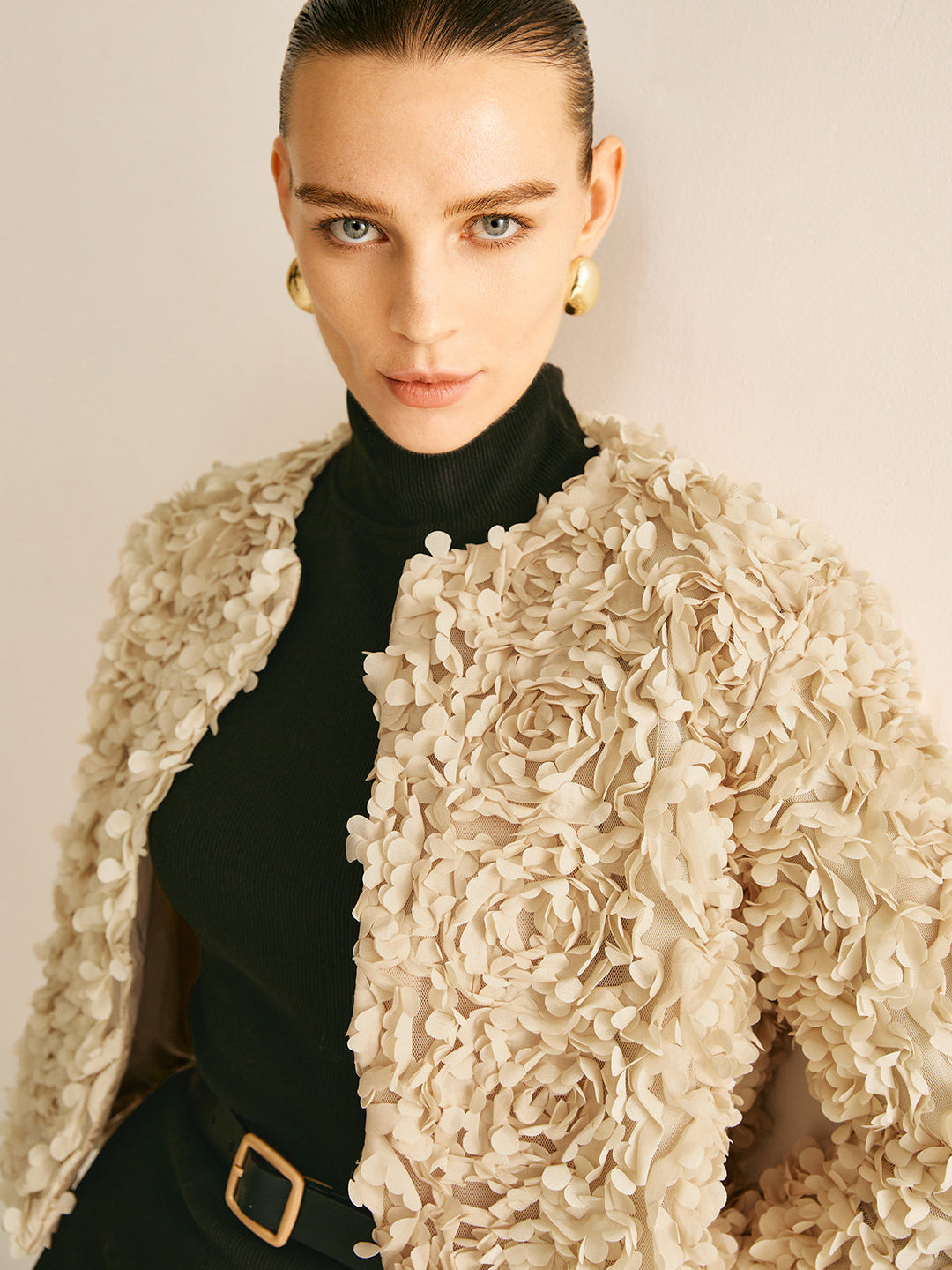 Fashionable women's beige crew neck blazer, a versatile outerwear piece for various occasions.