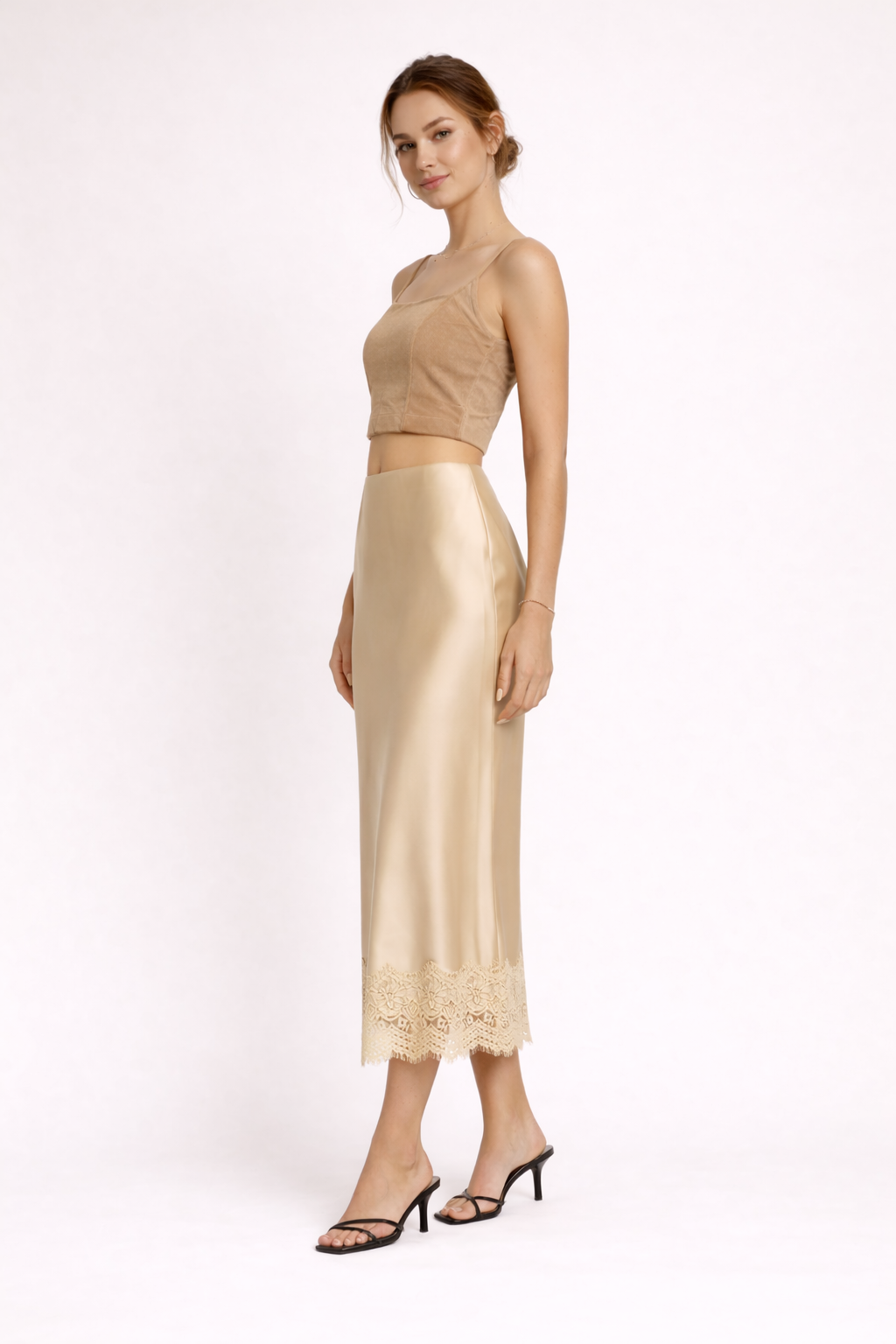 Black straight cut long maxi skirt for women, featuring a beautiful lace hem; ideal for formal wear.
