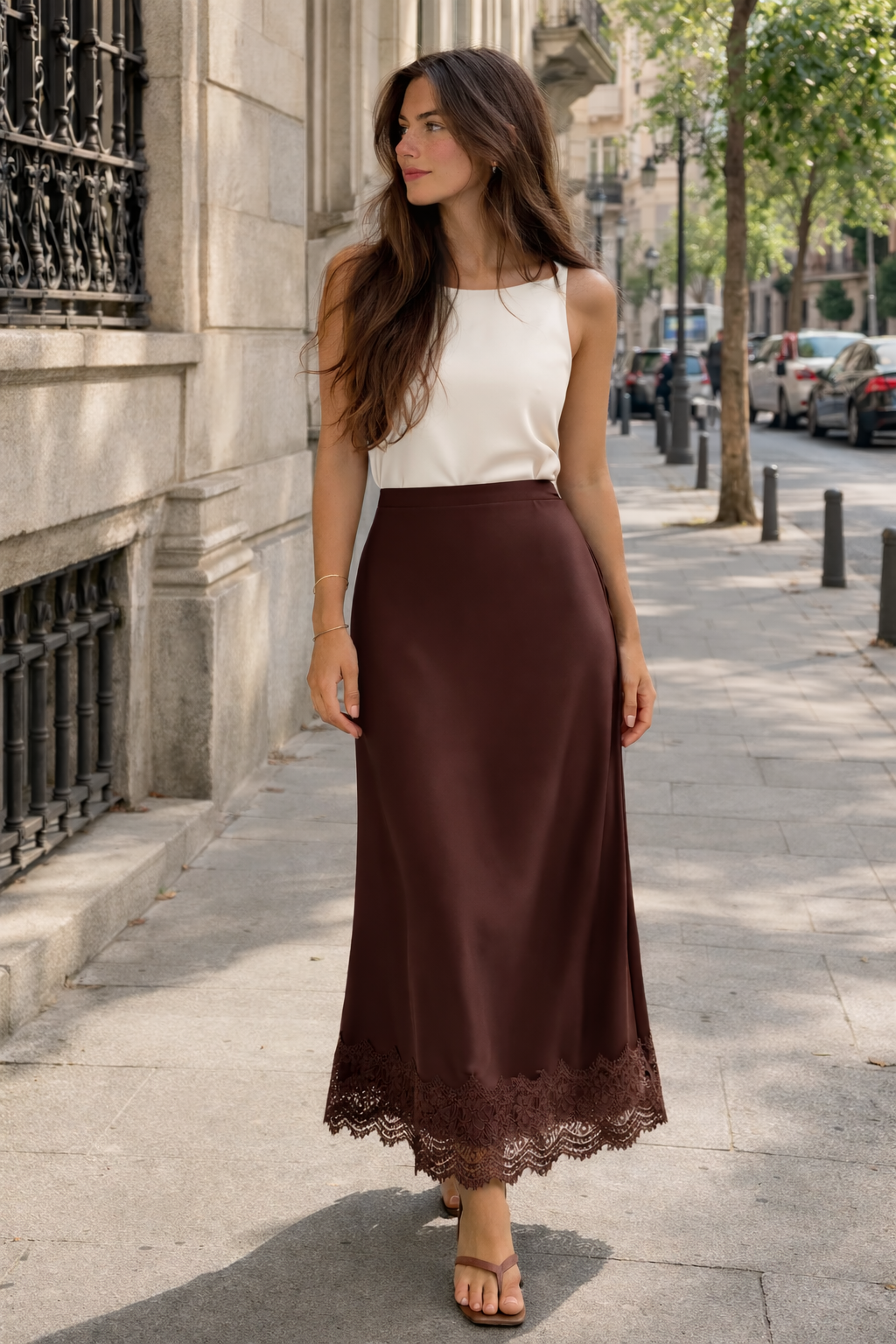 Long, straight cut women's maxi skirt with an elegant lace hem for formal events and evening wear.