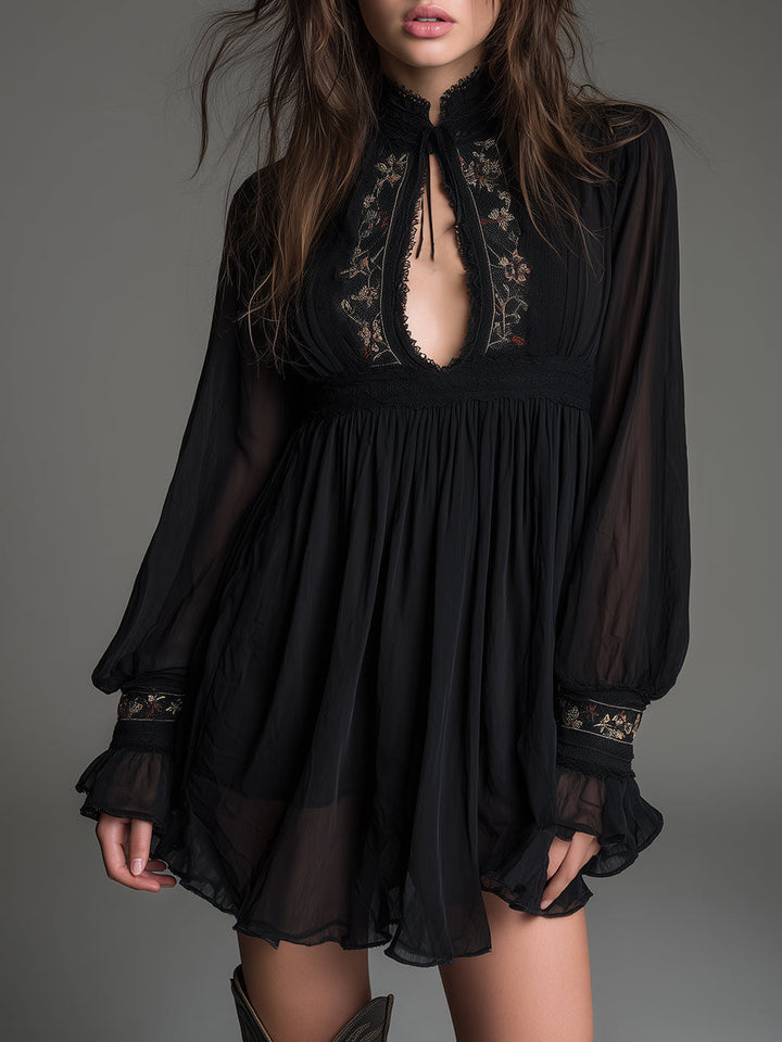 Elegant black babydoll mini dress for women, featuring a keyhole neckline and stylish balloon sleeves. Perfect for parties.