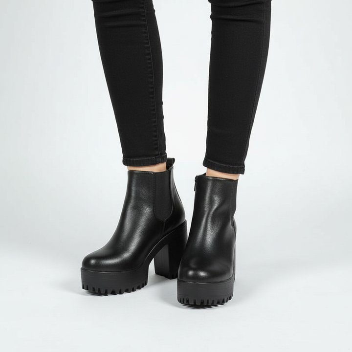 Stylish black block heel ankle boots, offering elegance and comfort for women, essential winter footwear.
