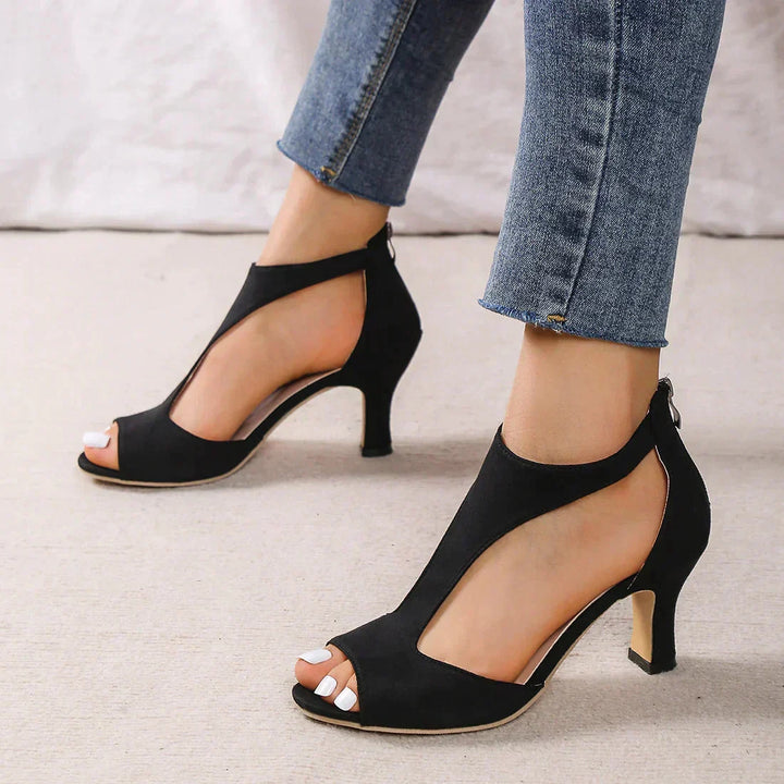 Stylish pink heeled sandals for women. Chic summer evening shoes with an elegant design for any celebration.