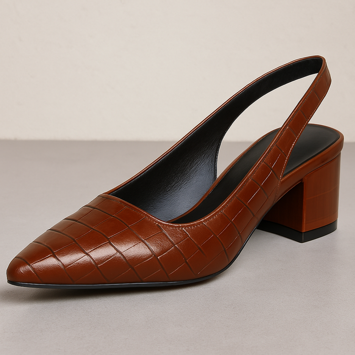 Detailed image of the durable sole and comfortable block heel on Annika slingback pumps
