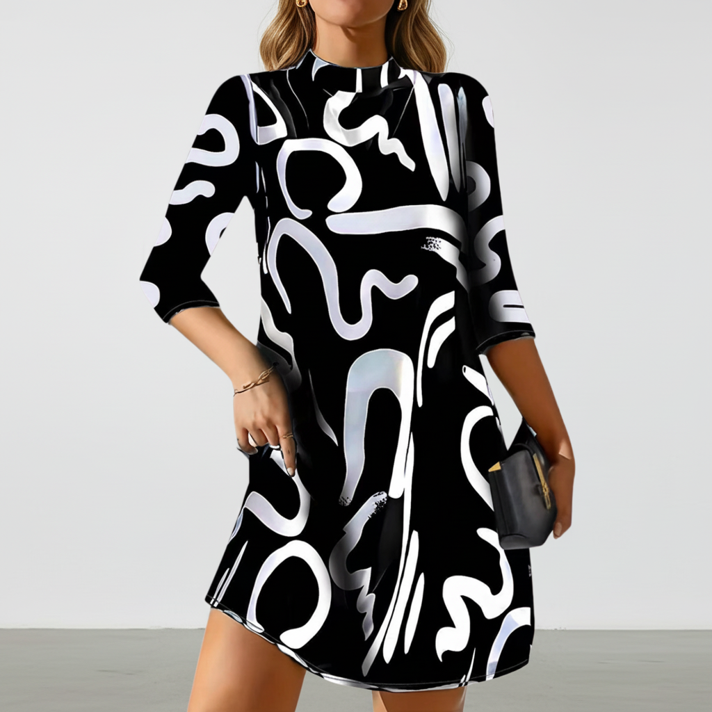 Nina mini dress with long sleeves in black, ideal for versatile officewear