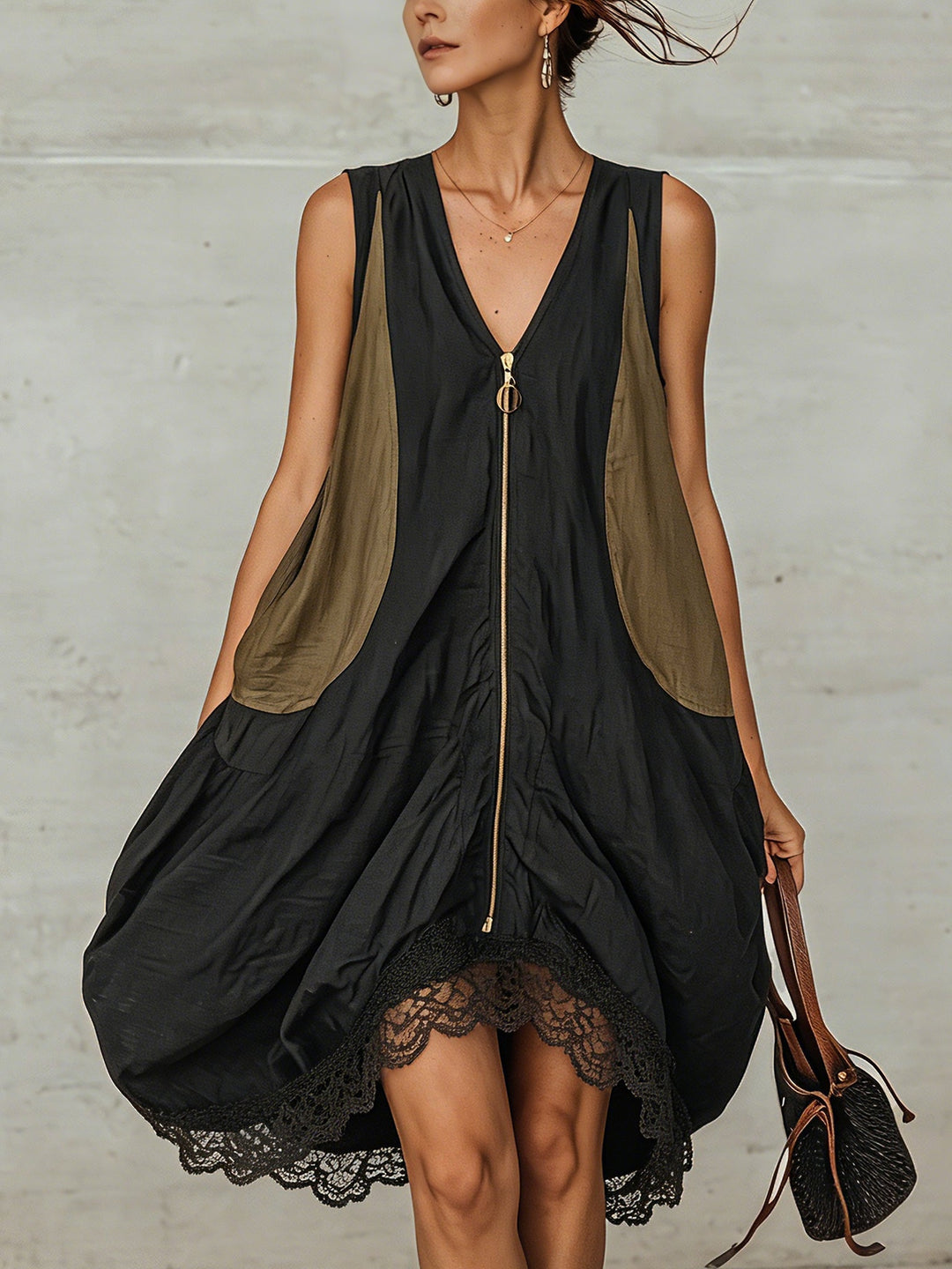 Elegant black midi dress for women, featuring a flattering V-neck, sleeveless cut, and delicate lace hem. Versatile style.