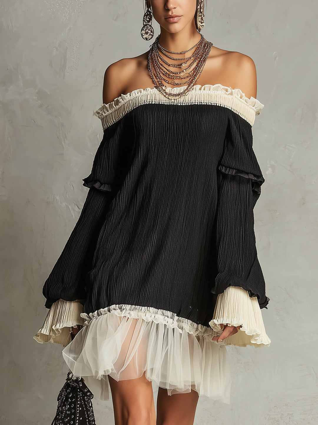 Elegant black off-shoulder mini dress with lace ruffles, perfect for parties & date nights.