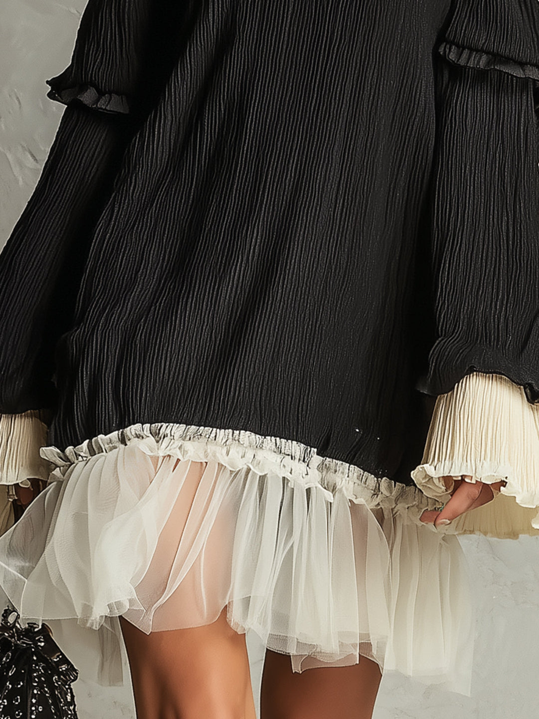 Sophisticated black off-shoulder evening mini dress with elegant lace ruffles, perfect for women.