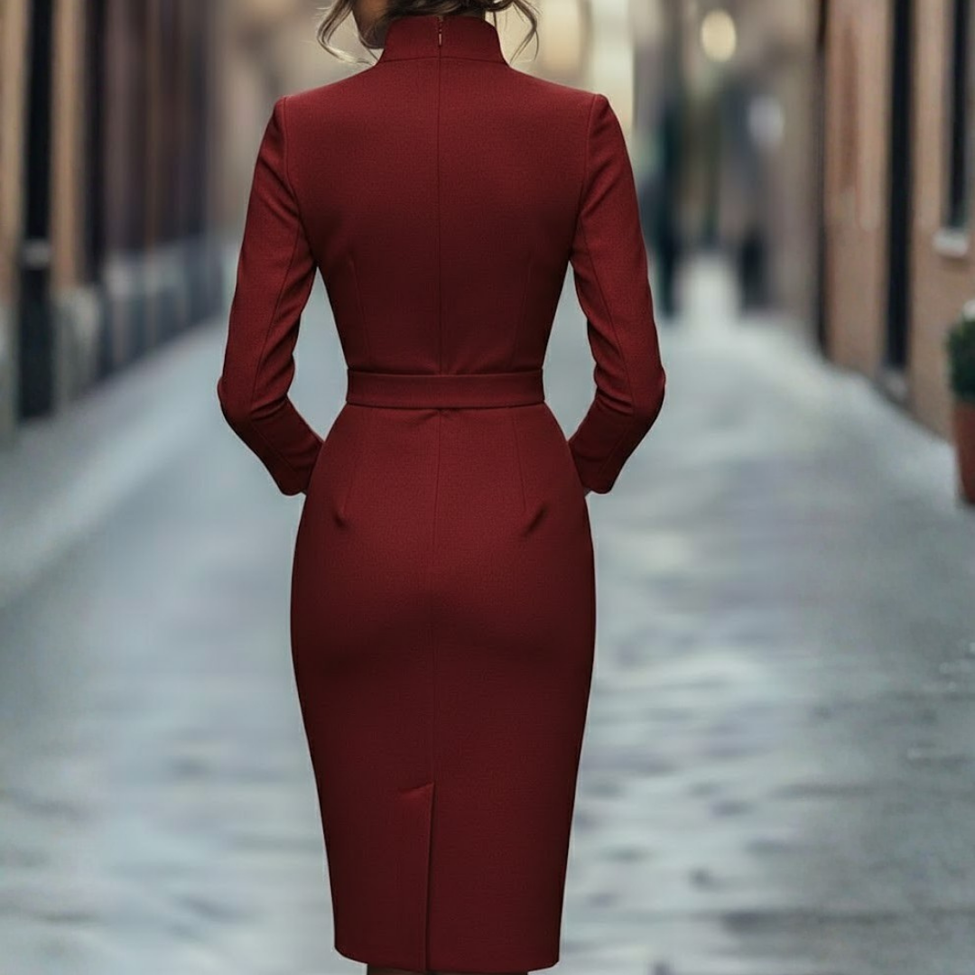Sophisticated black pencil dress with elegant mock wrap neckline, three-quarter sleeves, ideal for professional women.