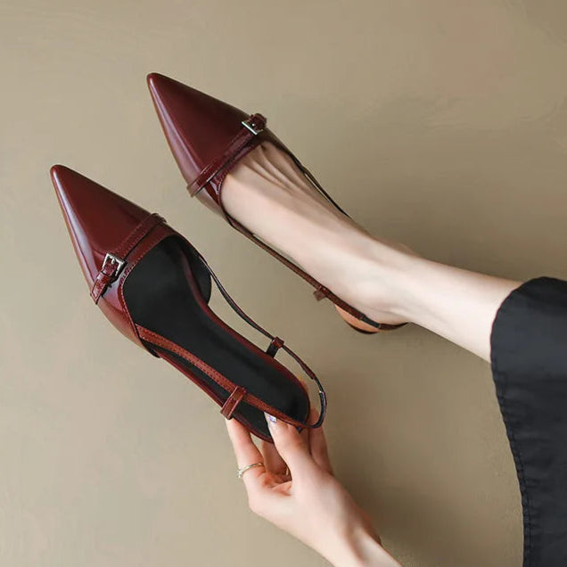Elegant black pointed toe slingback kitten heels for women, perfect for office or formal wear.