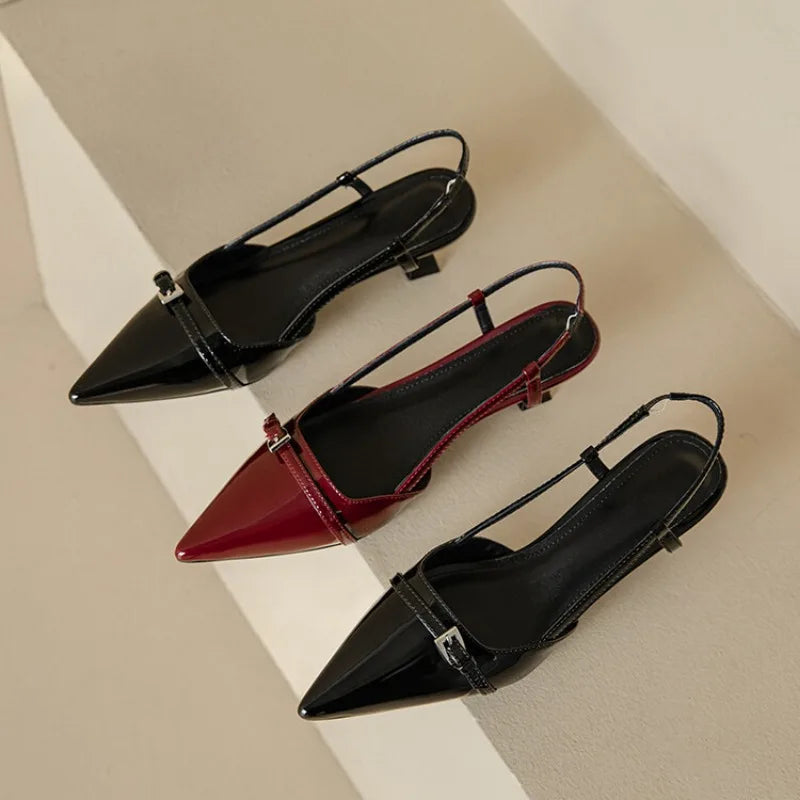 Versatile black fashion heels, women's elegant pointed toe slingback kitten heel for various occasions.