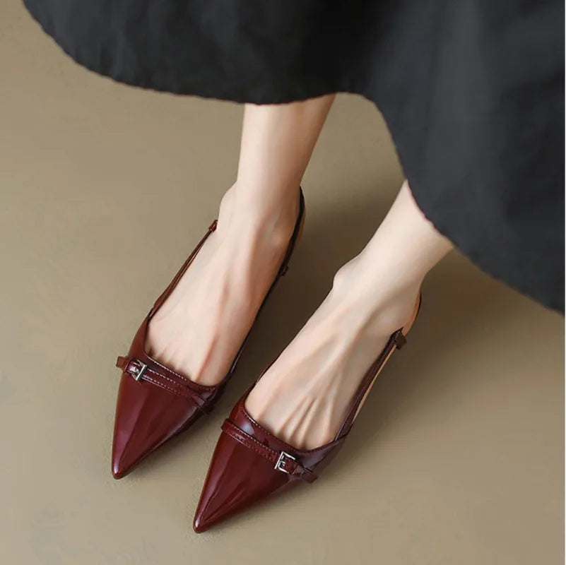 Stylish burgundy women's kitten heels, featuring a pointed toe and comfortable slingback design.